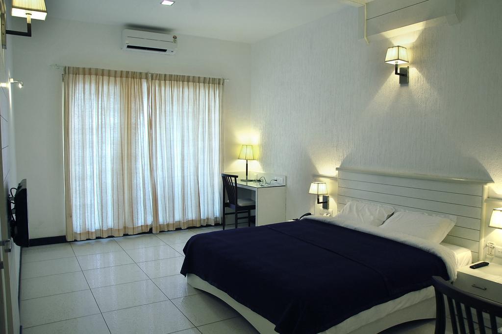 Blue Waters Hotell Kundapur Rum bild